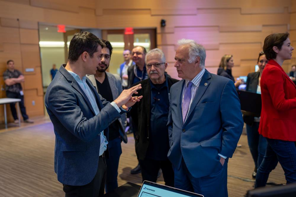 IAGV Invests in Recomaze - Recomaze Founder and CEO, Delian Coroama with Austin’s Mayor Kirk Watson at The International House during SXSW